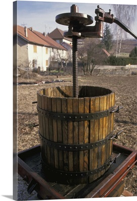 France, Jura. Wine press at winery in village of Poligny