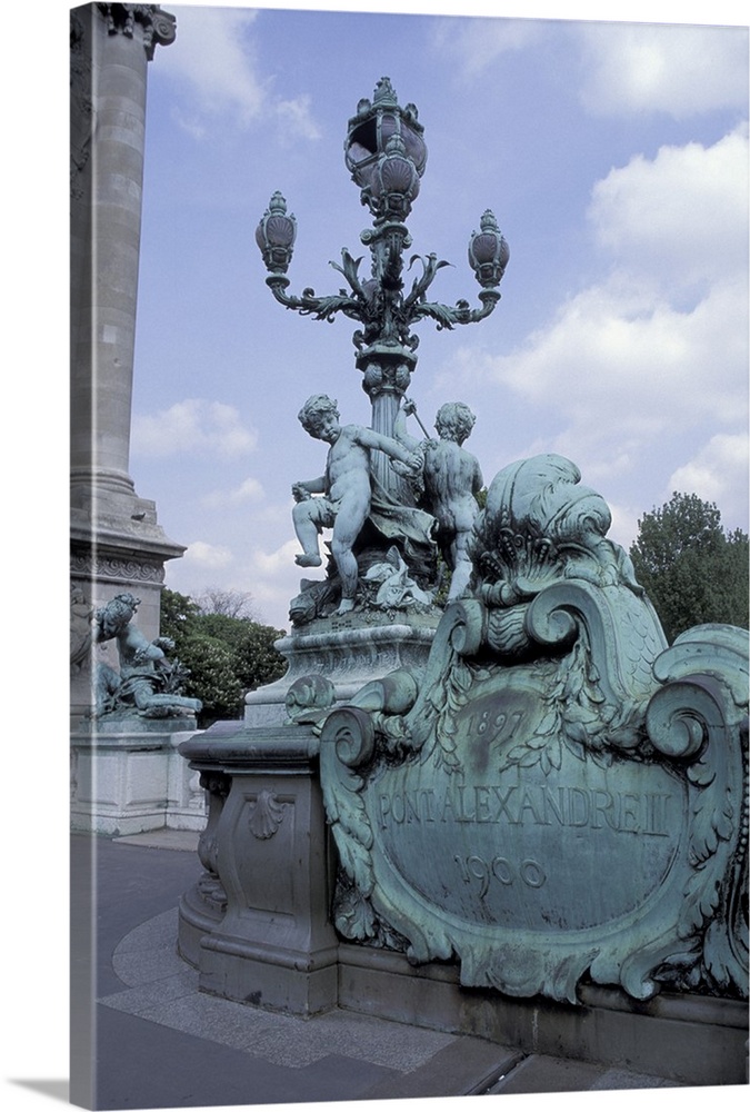 EU, France, Paris. Seine River Bridge and statue.