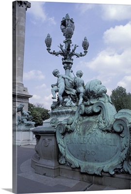 France, Paris. Seine River Bridge and statue