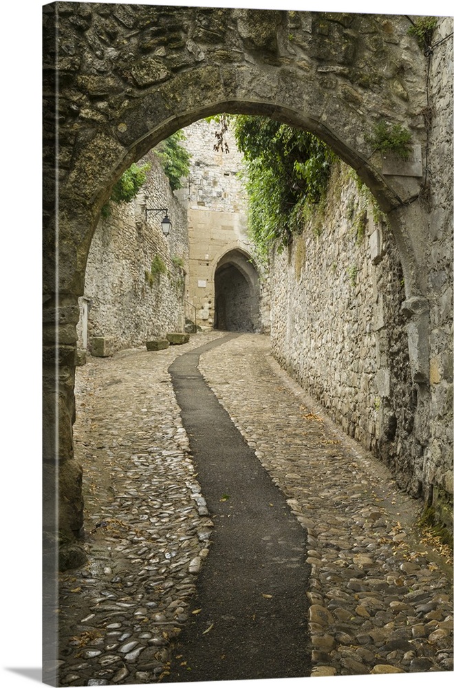 France, Provence. Ancient stone buildings and walkways in the village of Vaison du Romain.