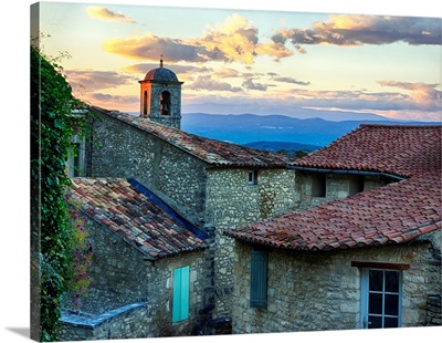 France, Provence, Lacoste, Church Bell Tower and City at Sunset