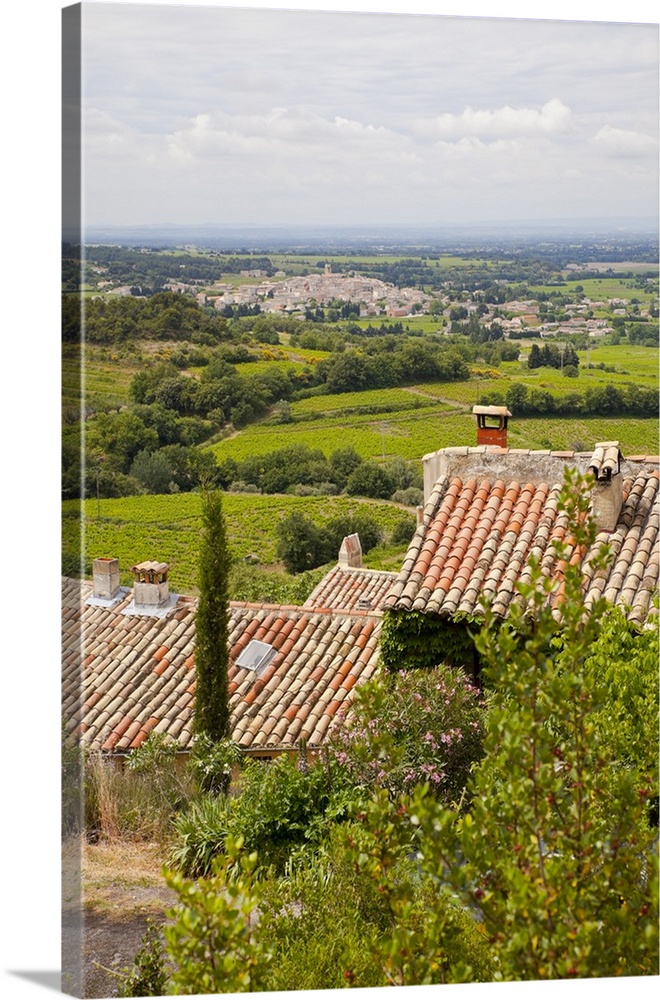 France, Provence, Seguret. View of countryside above tiled rooftops. Credit as: Fred Lord / Jaynes Gallery / DanitaDelimon...