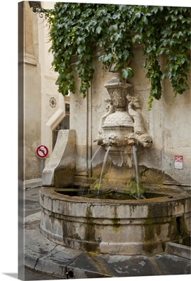 France, Provence, St. Remy-de-Provence. Water fountain on street corner