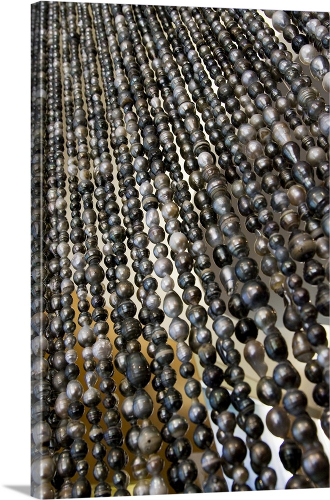 South Pacific, French Polynesia, Society Islands, Bora Bora. Close-up of  curtain of black pearls.