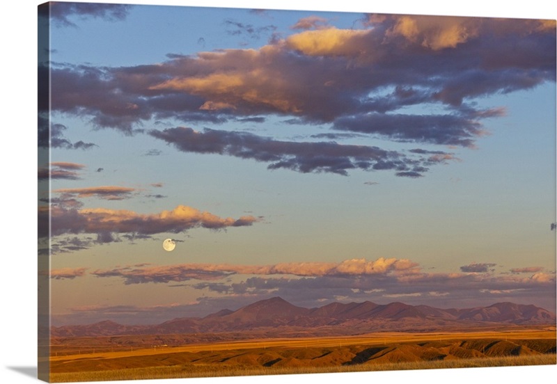 Full moon rises above the Highwood Mountains near Great Falls, Montana