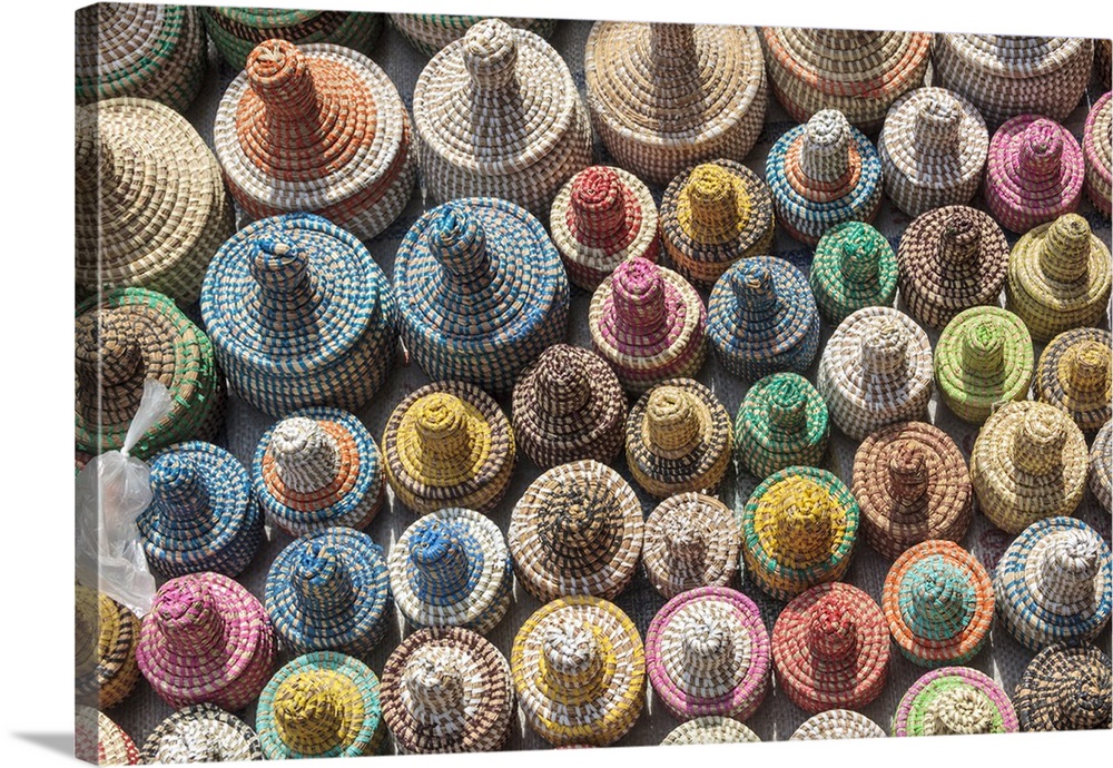 Africa, Gambia, Banjul. Collection of colorful woven baskets viewed from above.