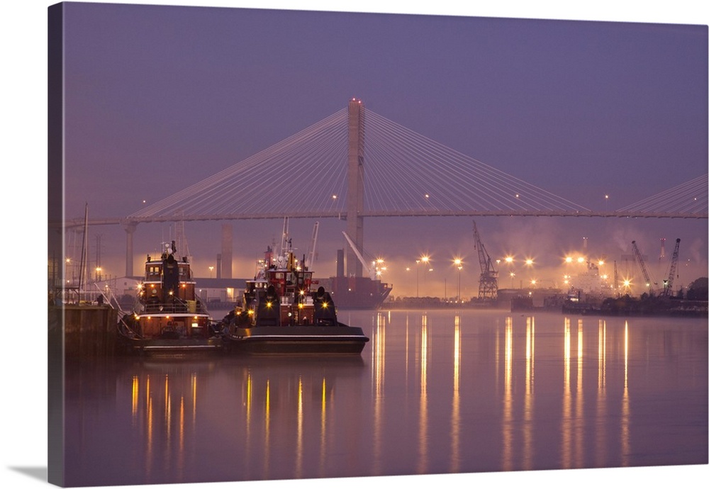 USA, Georgia, Savannah, Tugboats and bridge at dawn along the Savannah River.