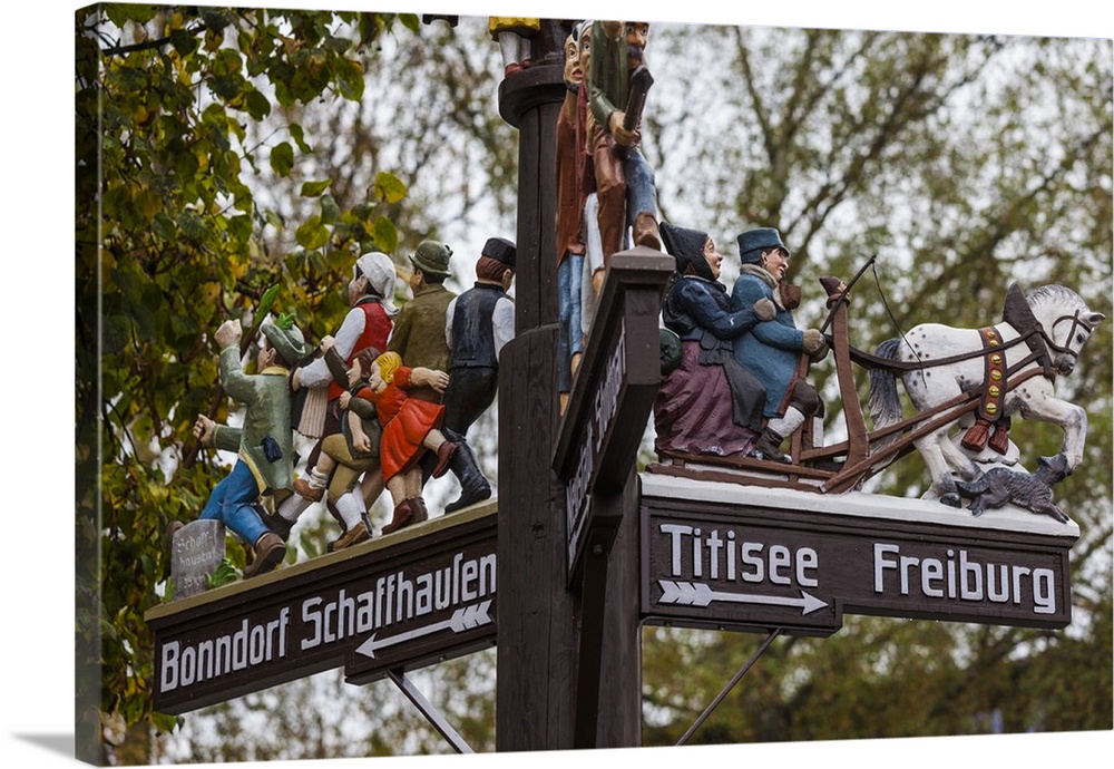 Germany, Black Forest, Lenzkirch, traditional wooden road signs.