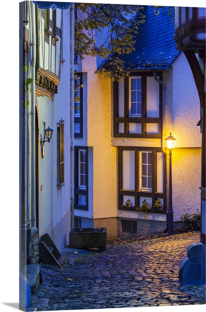 Germany, Hesse, Limburg an der Lahn, traditional half-timbered building at dawn.