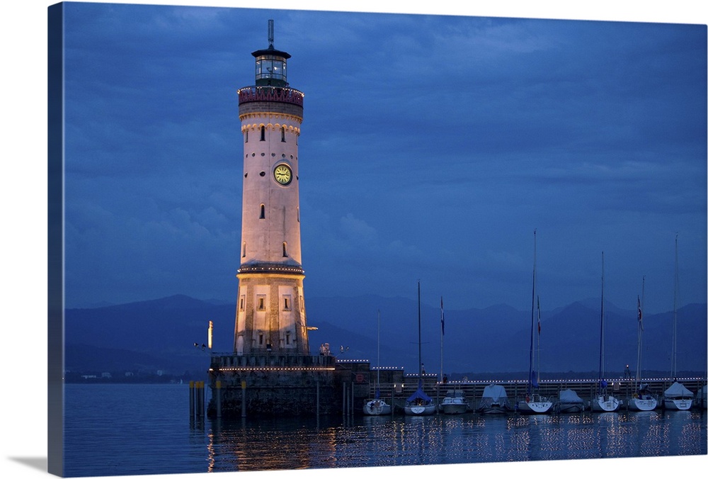 Germany, Lake Constance, View of lighthouse on Lindau Island at sunset