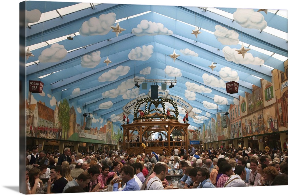 Germany, Munich, Revelers inside one of the many beer halls at Oktoberfest