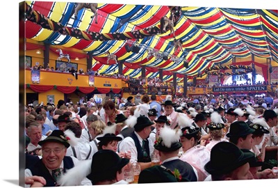 Germany, Munich, Revelers inside one of the many beer tents at Oktoberfest