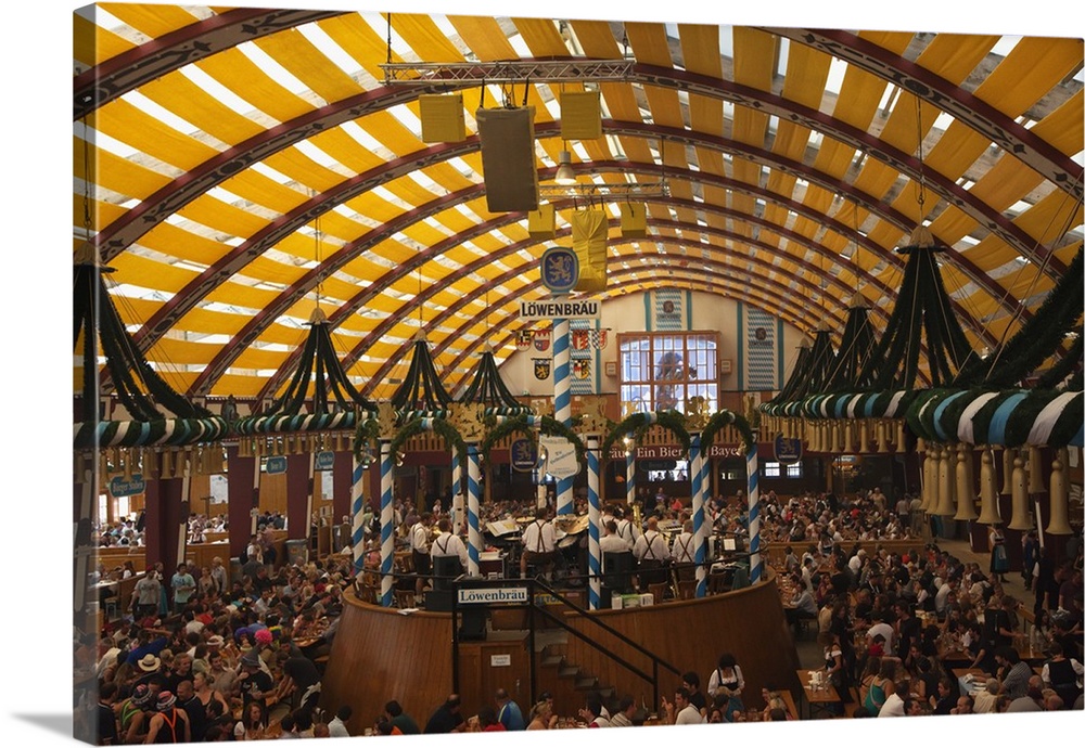 Germany, Munich, Revelers inside one of the many beer tents at Oktoberfest