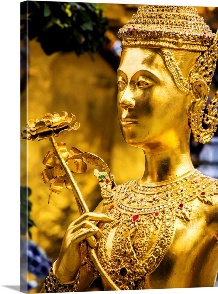 Golden Kinnara statue at Emerald Buddha Temple (Wat Phra Kaew) in Grand Palace