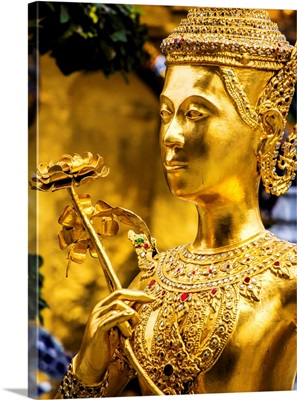 Golden Kinnara Statue At Emerald Buddha Temple In Grand Palace In Thailand