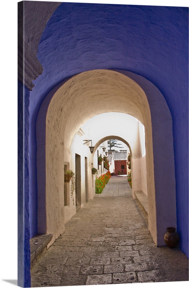 Graceful archways of Monasterio Santa Catalina in the "White City" of Arequipa, Peru.