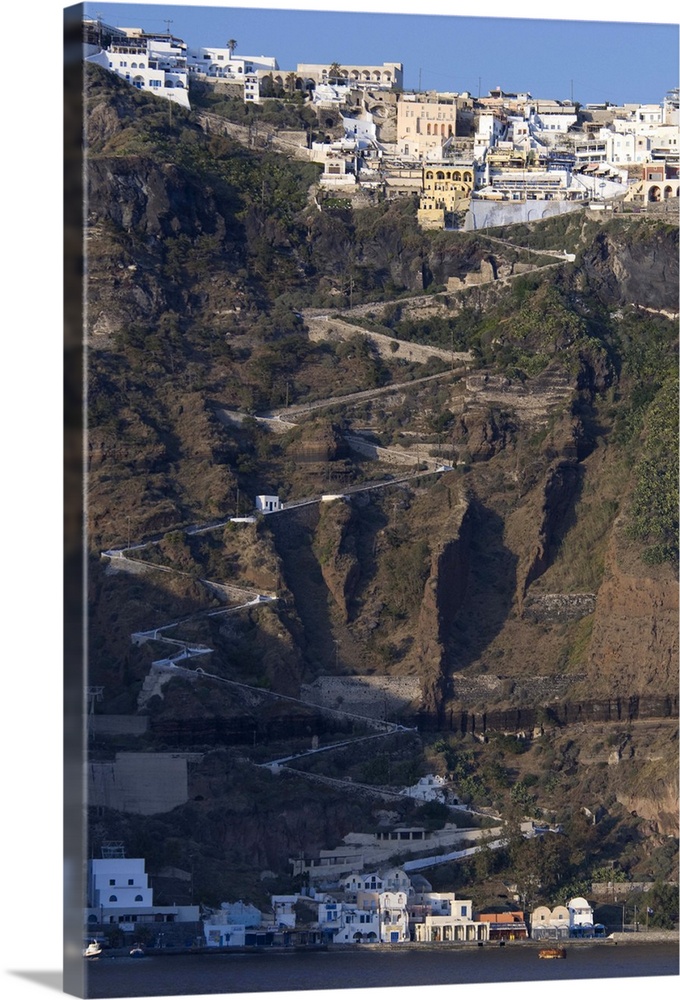 Greece, Cyclades, Island of Santorini (aka Thira). Zig-zag road to the capital city of Fira located a top volcanic caldera.