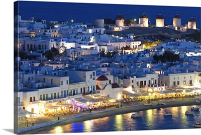 Greece, Mykonos, Hora. Night View Overlooking Harbor With Illuminated Windmills