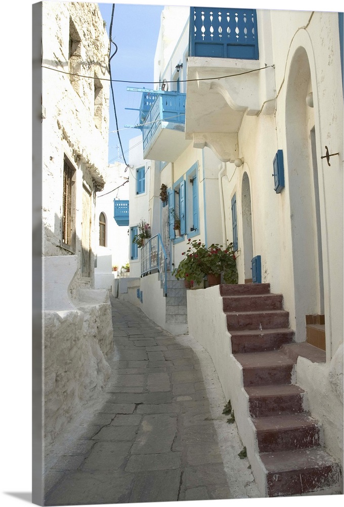 Greece, Dodecanese Islands, Nisyros: narrow streets of Mandraki with coloured wooden balconies