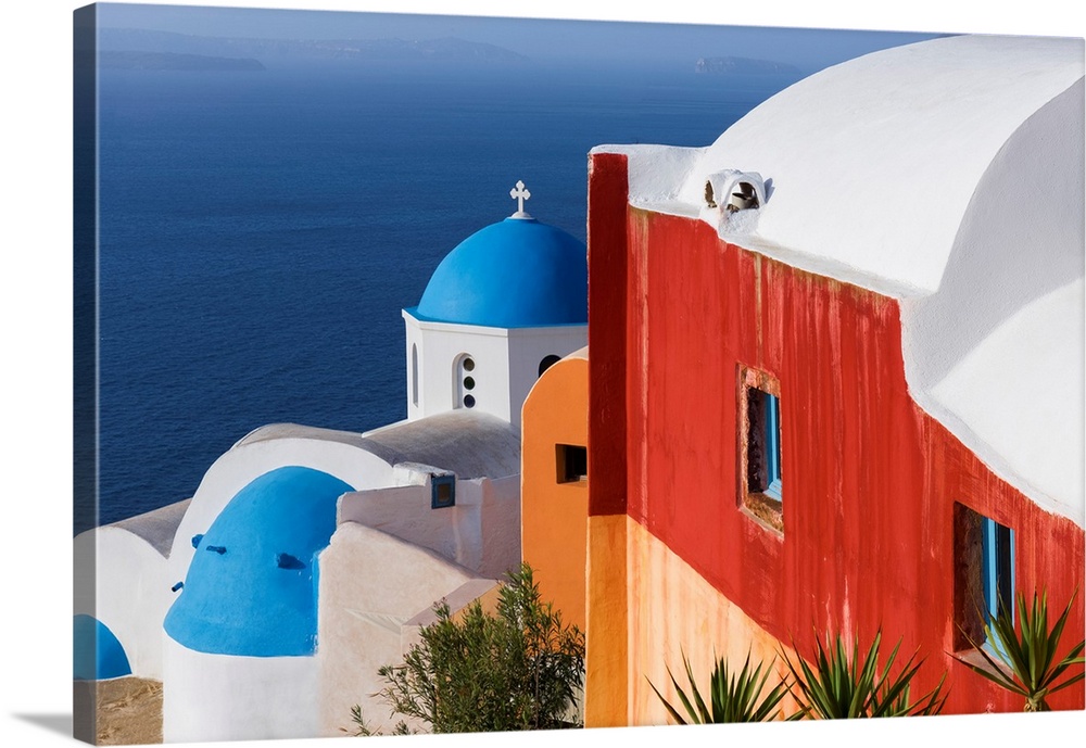 Greece, Santorini, Oia. Colorful house and church. Credit: Jim Nilsen