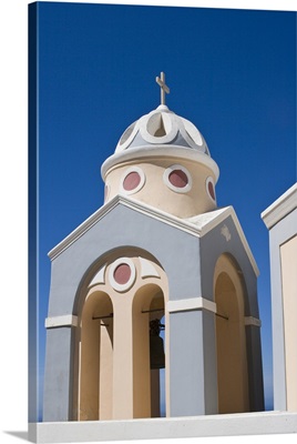 Greece, Santorini, Peach And Grey Church Bell Tower Against Clear Blue Sky