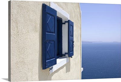 Greece, Santorini, Thira, Blue-Shuttered Window In Pale Yellow Wall