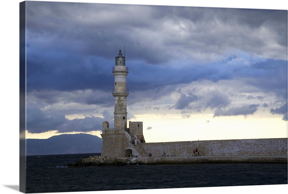 Greek Island of Crete and old town of Chania  with Venetian Lighthouse along the old harbor