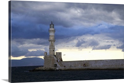 Greek Island Of Crete And Old Town Of Chania With Lighthouse Along The Harbor