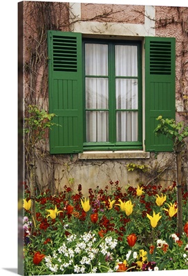 Green Shutters With A Beautiful Flowerbed Accent At Monet'S House In Giverny, France