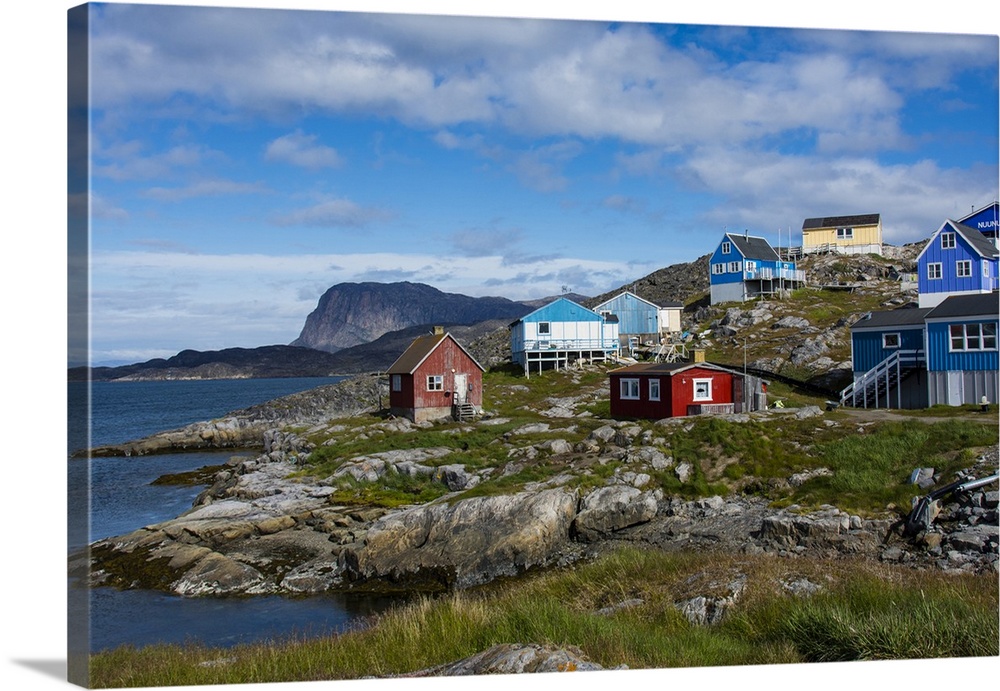 Greenland. Itilleq. Colorful houses dot the hillside.