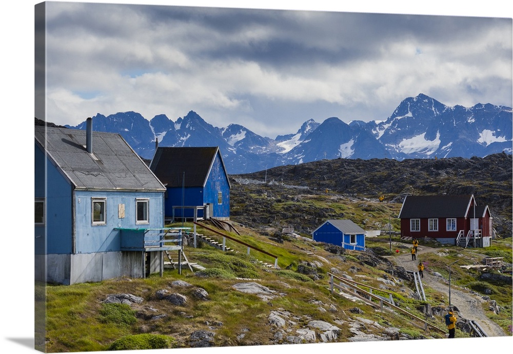 Greenland, Itilleq. Visitors exploring town.