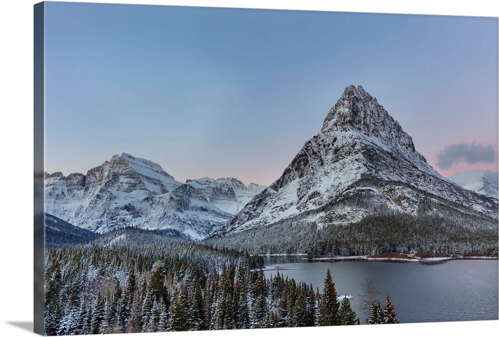 Grinnell Point and Mount Gould over Swiftcurrent Lake in ealry winter in Glacier National Park, Montana, USA
