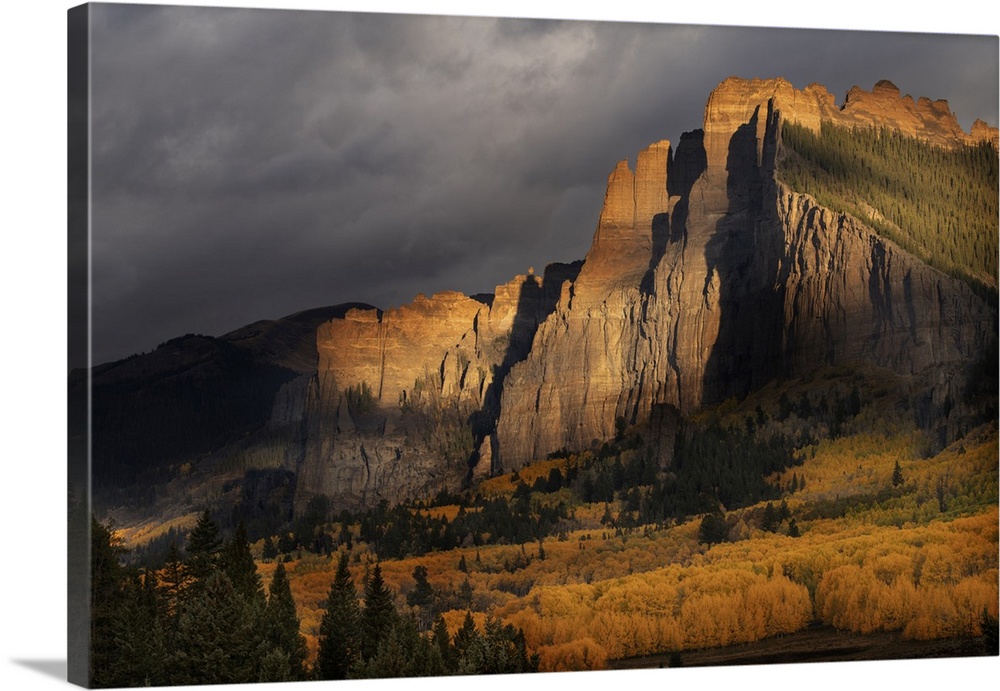USA, North America, Colorado. USA, Colorado, Gunnison National Forest, The Castles Rock Formation On A Stormy Autumn Sunrise.