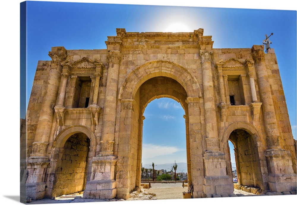 Hadrian's Arch Gate Sun Ancient Roman City Jerash Jordan. Jerash came to power 300 BC to 100 AD and was a city through 600...