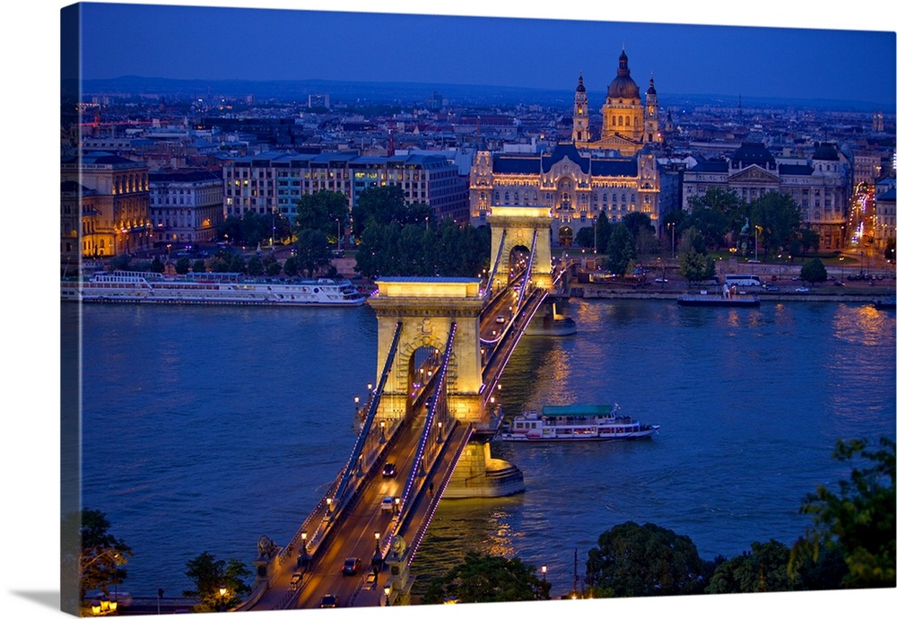 Hungary, Budapest. Chain Bridge lit at night.