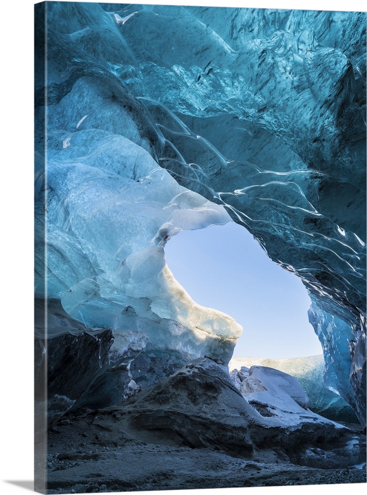 Ice cave in the glacier Breidamerkurjokull in Vatnajokull National Park. Entrance to the Ice Cave. .