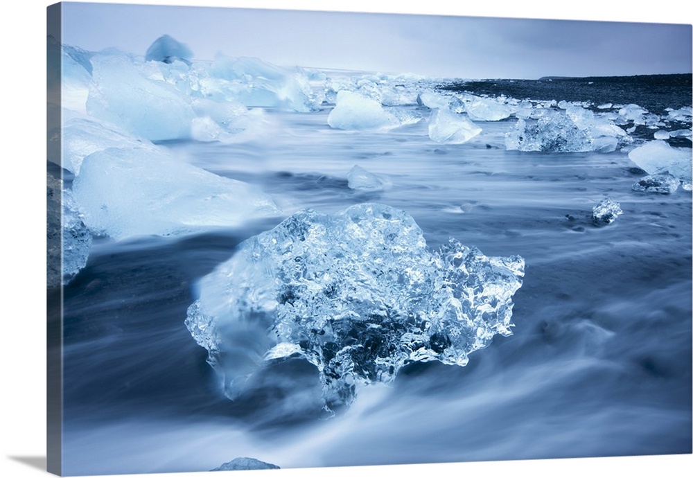 Iceland, Skaftafell National Park, Icebergs from Vatnajokull Glacier in waves from North Atlantic Ocean at Jokulsarlon