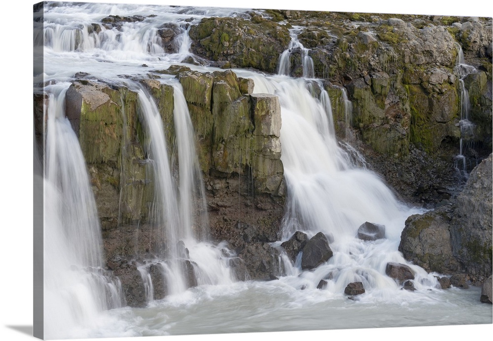 Iceland, Gygjarfoss Waterfall Flows Through A Rather Barren Landscape