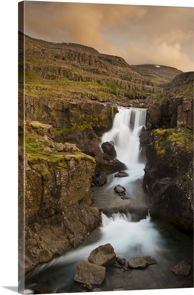 Europe, Iceland. Waterfall in Berufjordur Fjord. Credit as: Don Grall / Jaynes Gallery / DanitaDelimont.com