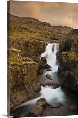 Iceland. Waterfall in Berufjordur Fjord