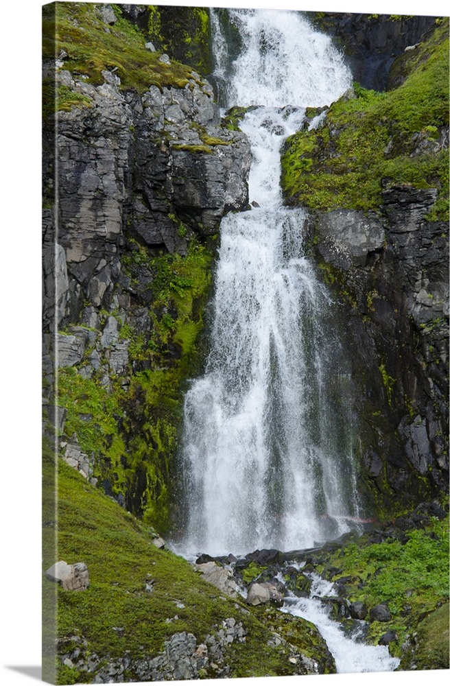 Iceland, Westfjords, Jokulflrdir, Lonagfjordur Nature Reserve. Remote fjord waterfall.