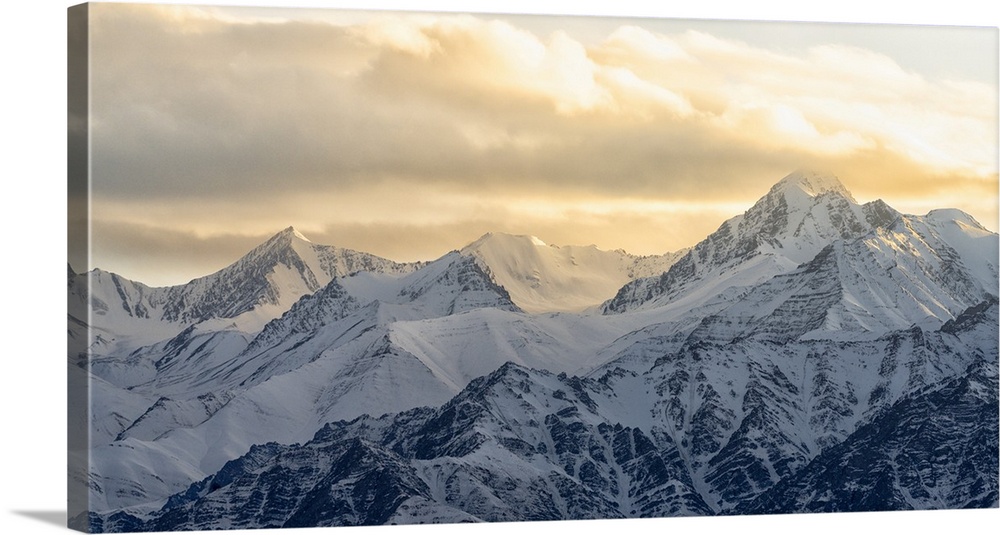 India, Ladakh, Leh, Himalaya Mountains. The mountains around the town of Leh are lit up by the setting sun.