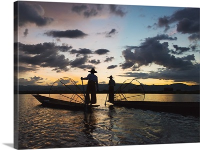 Intha Fisherman Rowing Boat With Leg At Sunset On Inle Lake, Shan State, Myanmar