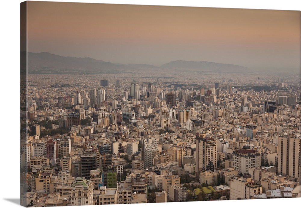 Iran, Tehran, elevated city skyline from the Roof of Iran Park, dusk