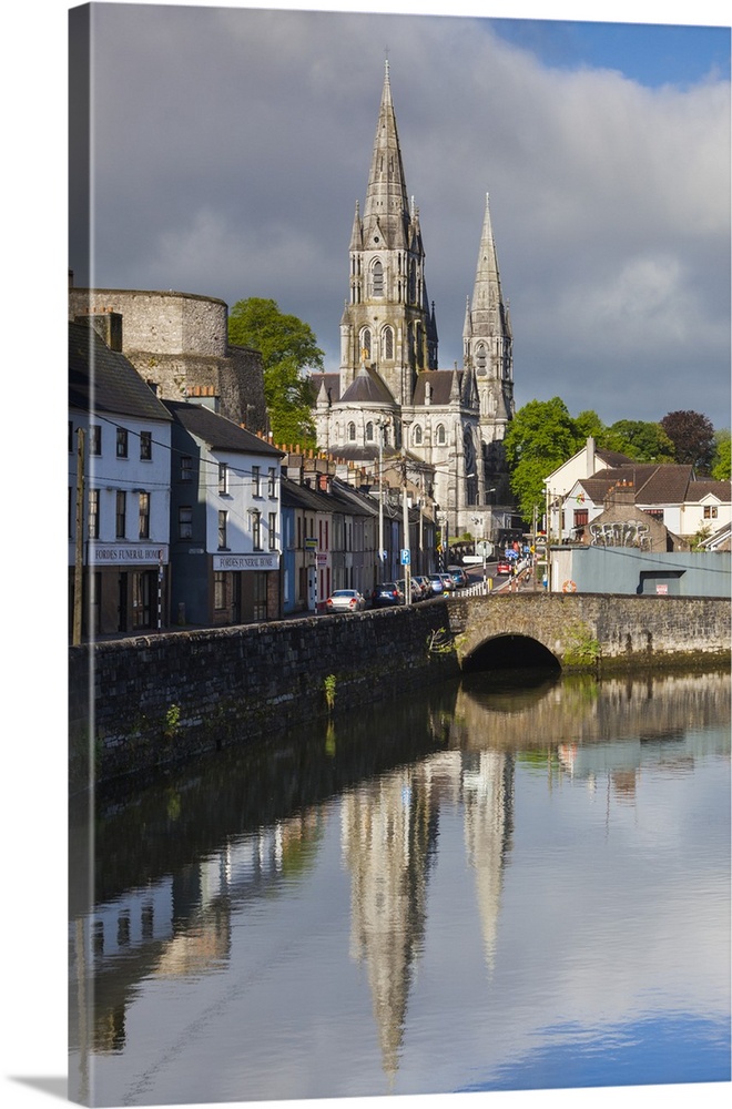 Ireland, County Cork, Cork City, St. Fin Barre's Cathedral, 19th century, from the River Lee, morning.