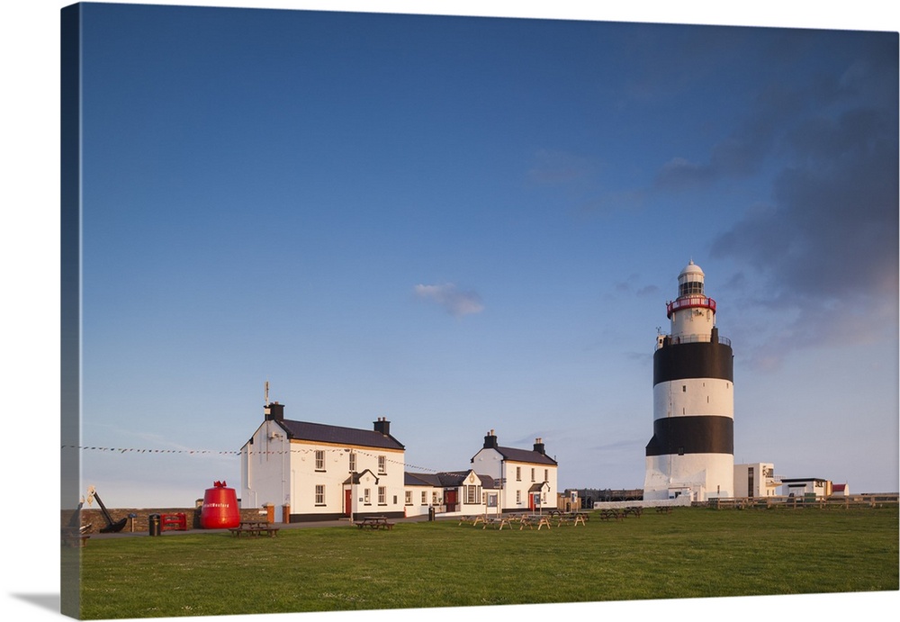 Ireland, County Wexford, Hook Peninsula, Hook Head, Hook Head Lighthouse, sunset.