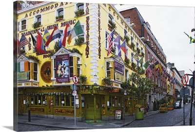 Ireland, Dublin. Flags and banners on Cogarty's pub in Temple Bar District