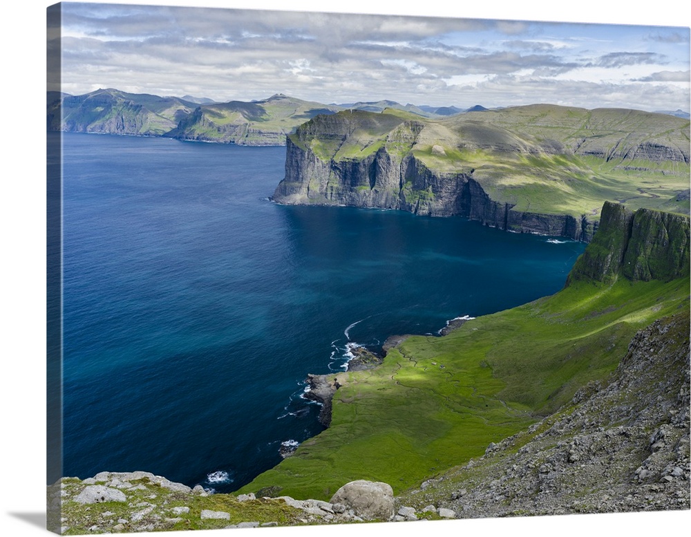 View over settlement Vikar towards Streymoy. Mountains of the island Vagar, part of the Faroe Islands. Europe, Northern Eu...