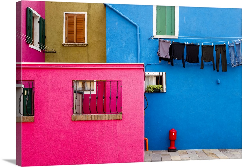 Italy, Burano. Colorful house walls. Credit: Jim Nilsen