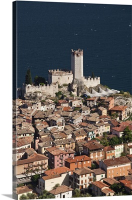 Italy, Malcesine. Aerial town view and Castello Scaligero from Monte Baldo.